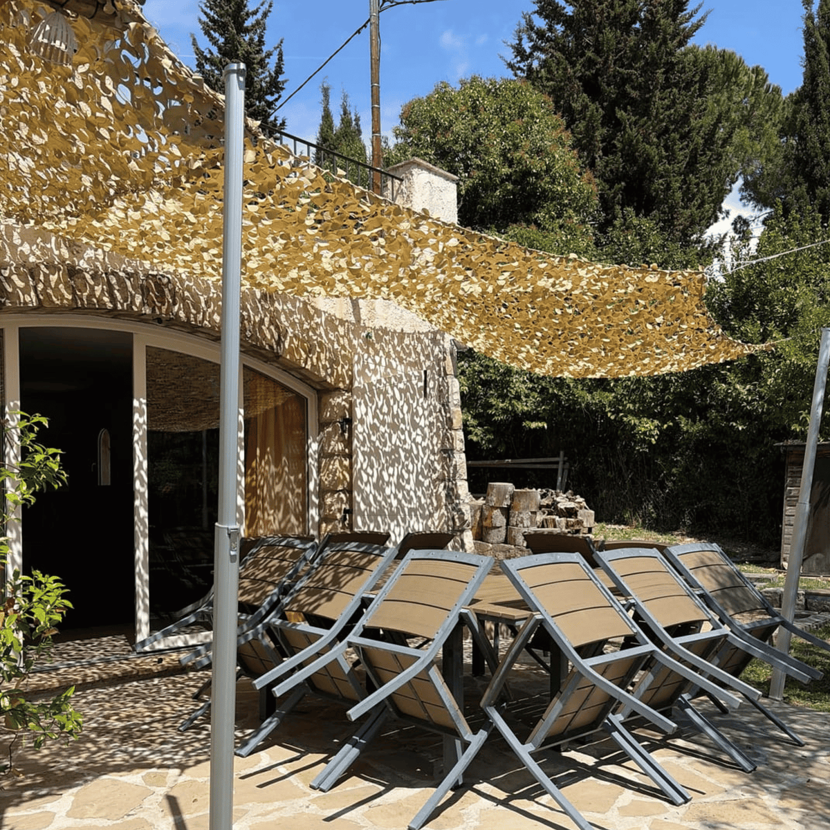 Voile d'ombrage camouflage renforcée à câble acier — détail de la matière