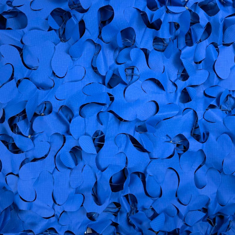 Voile d'ombrage camouflage triangulaire bleu — détail de la matière