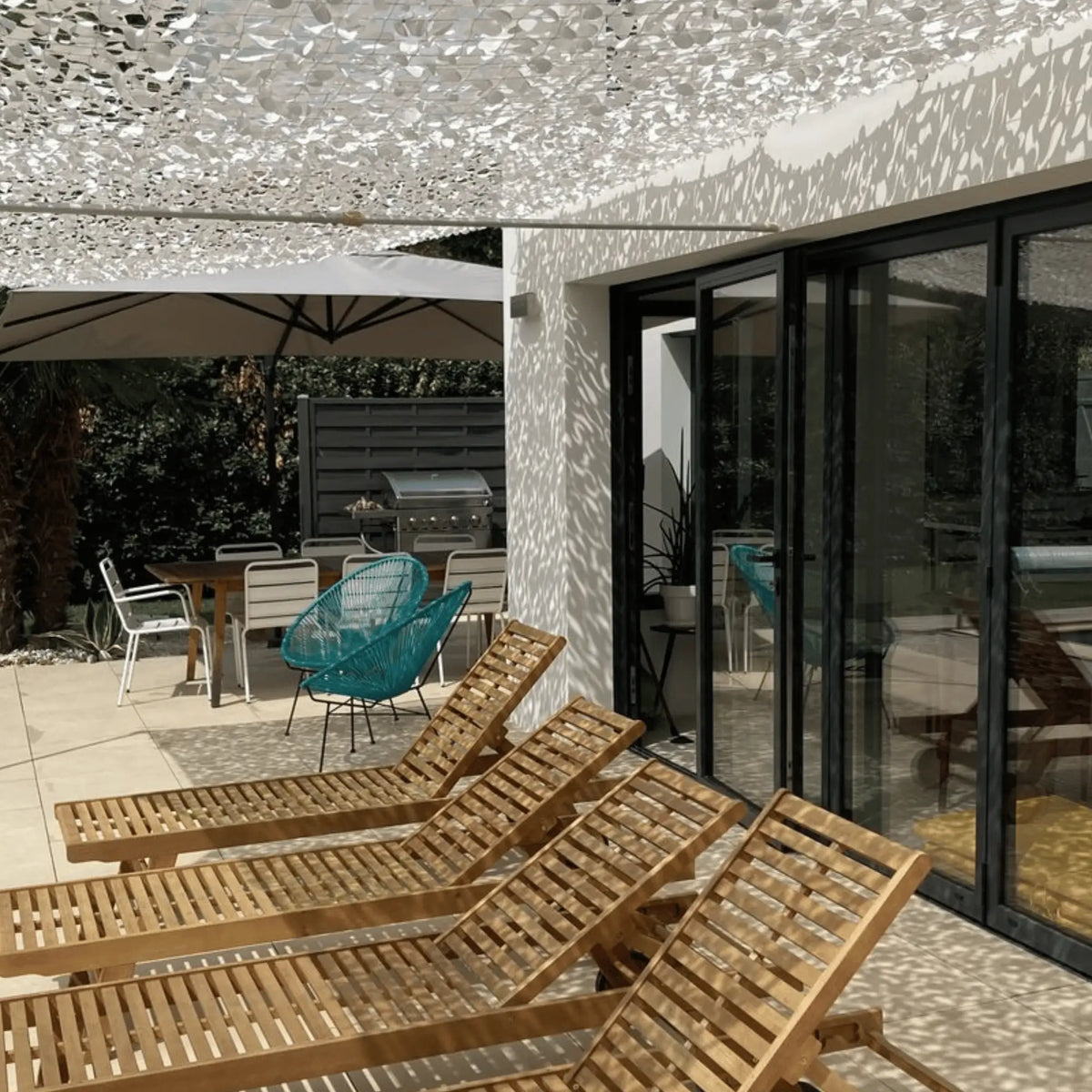 Voile d'ombrage camouflage blanc — détail de la matière