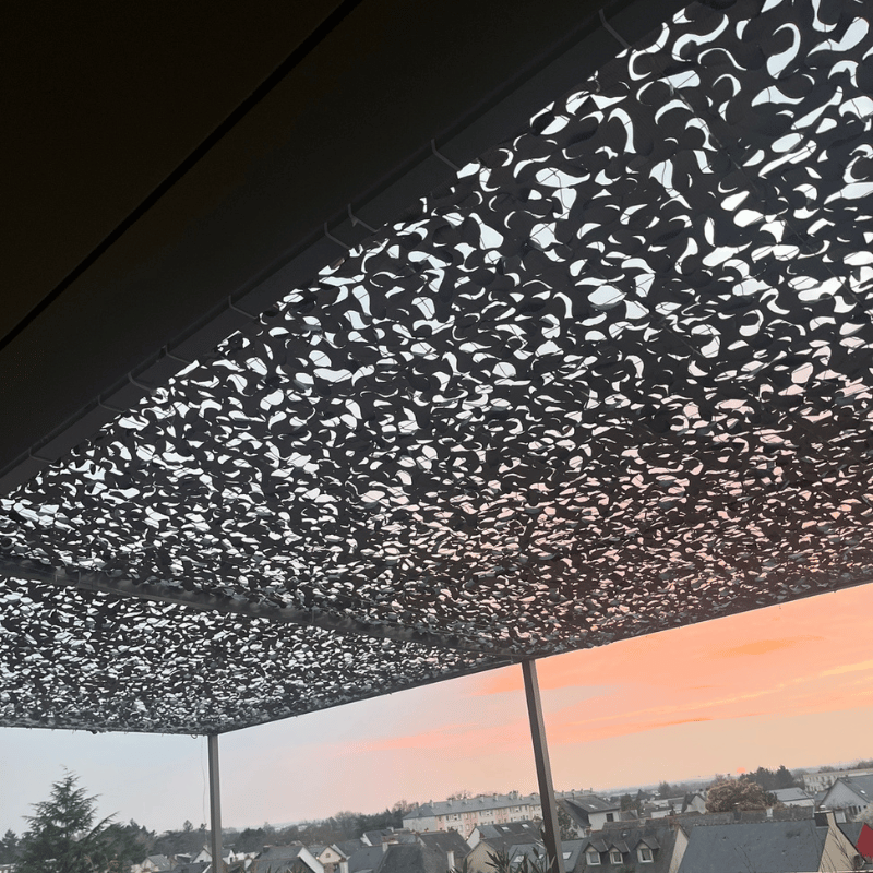 Voile d'ombrage camouflage gris — détail de la matière