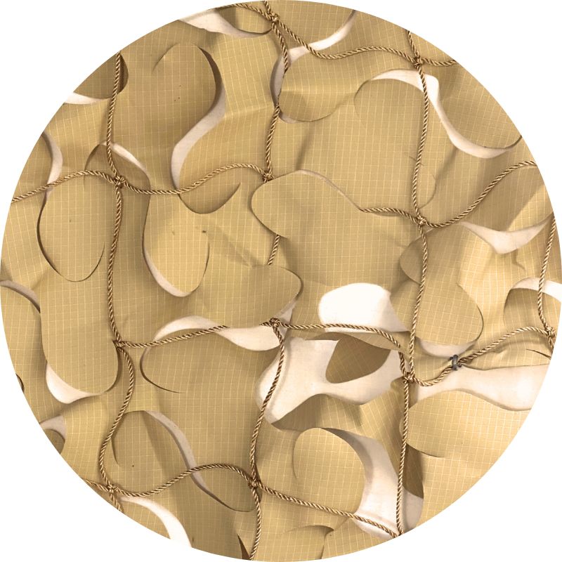Voile d'ombrage camouflage sable — détail de la matière